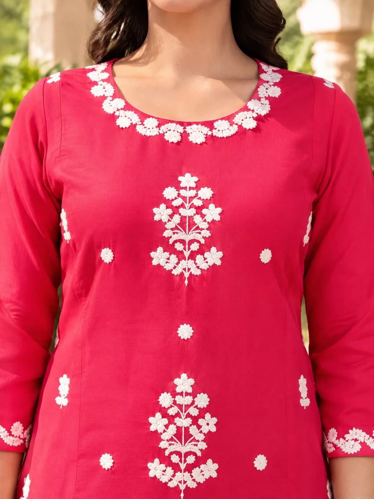 Embroidery on the red kurta
